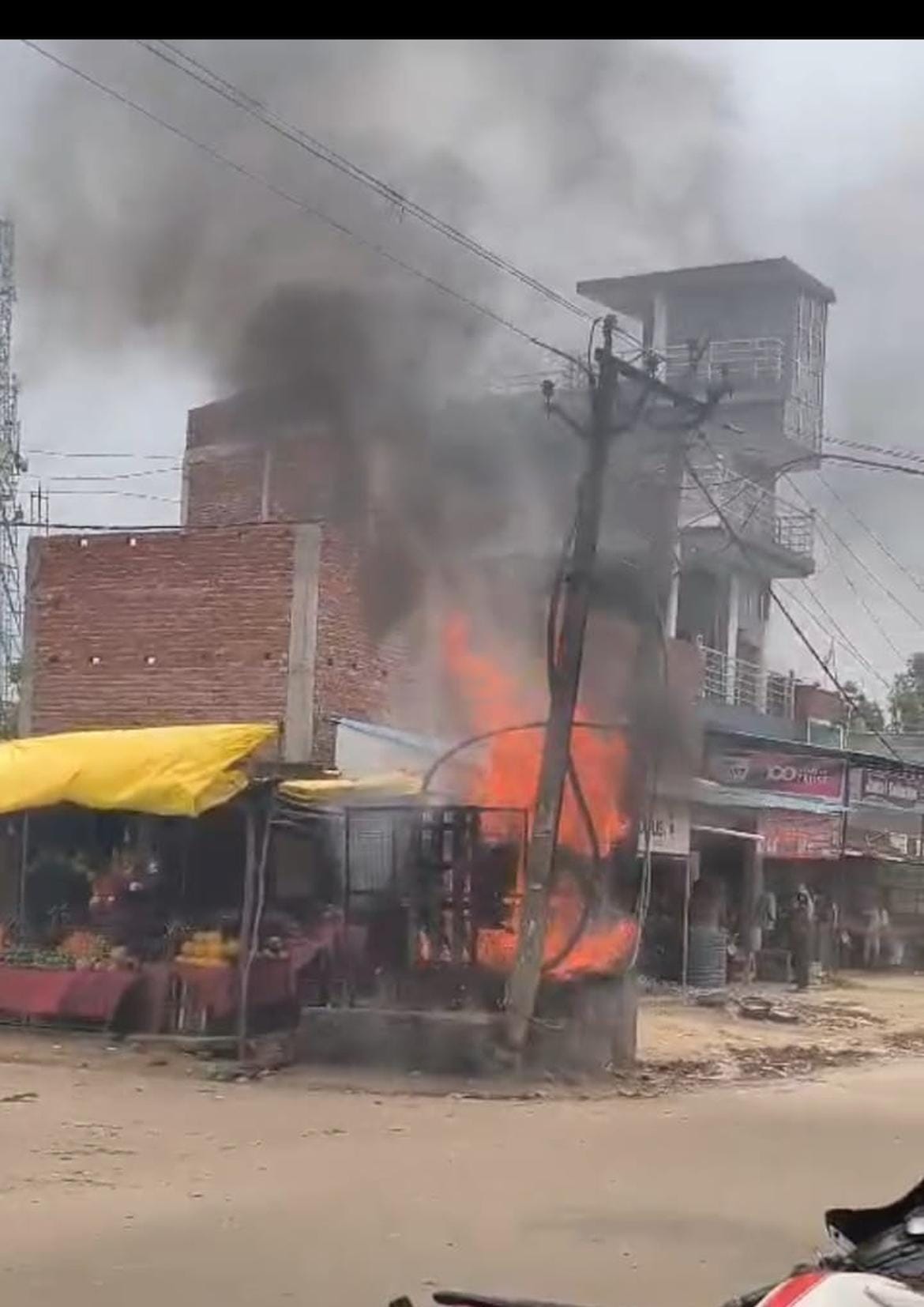 Appliances burnt due to high voltage; fire breaks out in transformer.