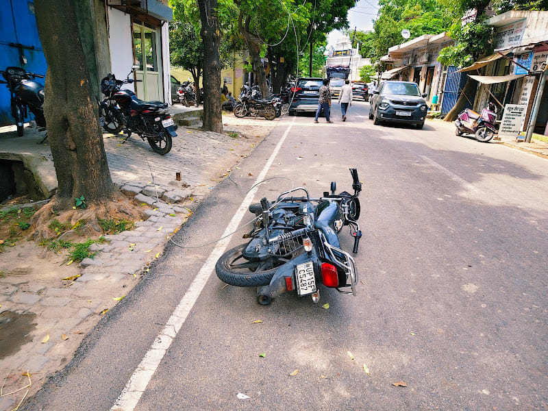 LT line wire snaps; motorcyclist has a narrow escape.