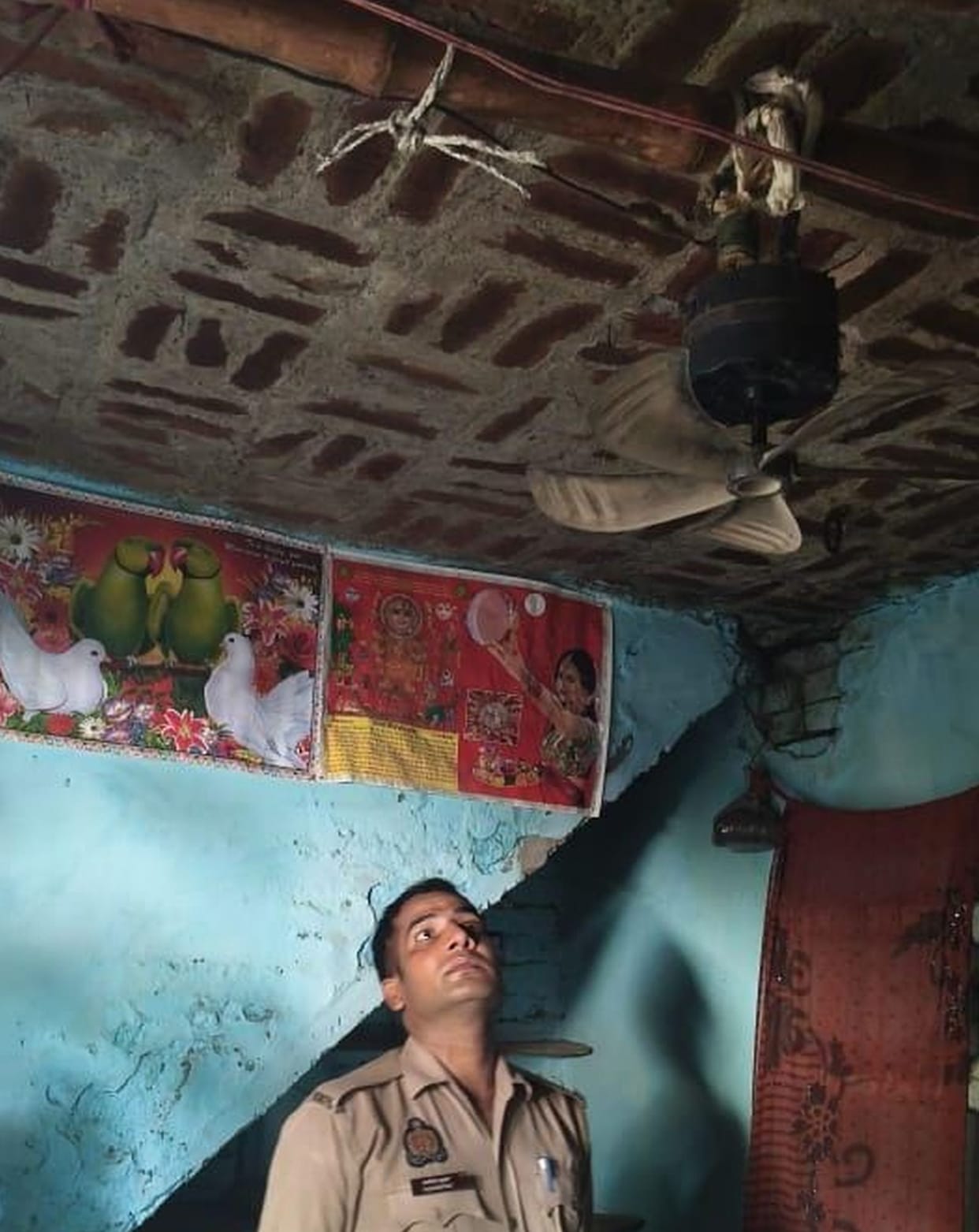 Body of young man found hanging in suspicious circumstances.