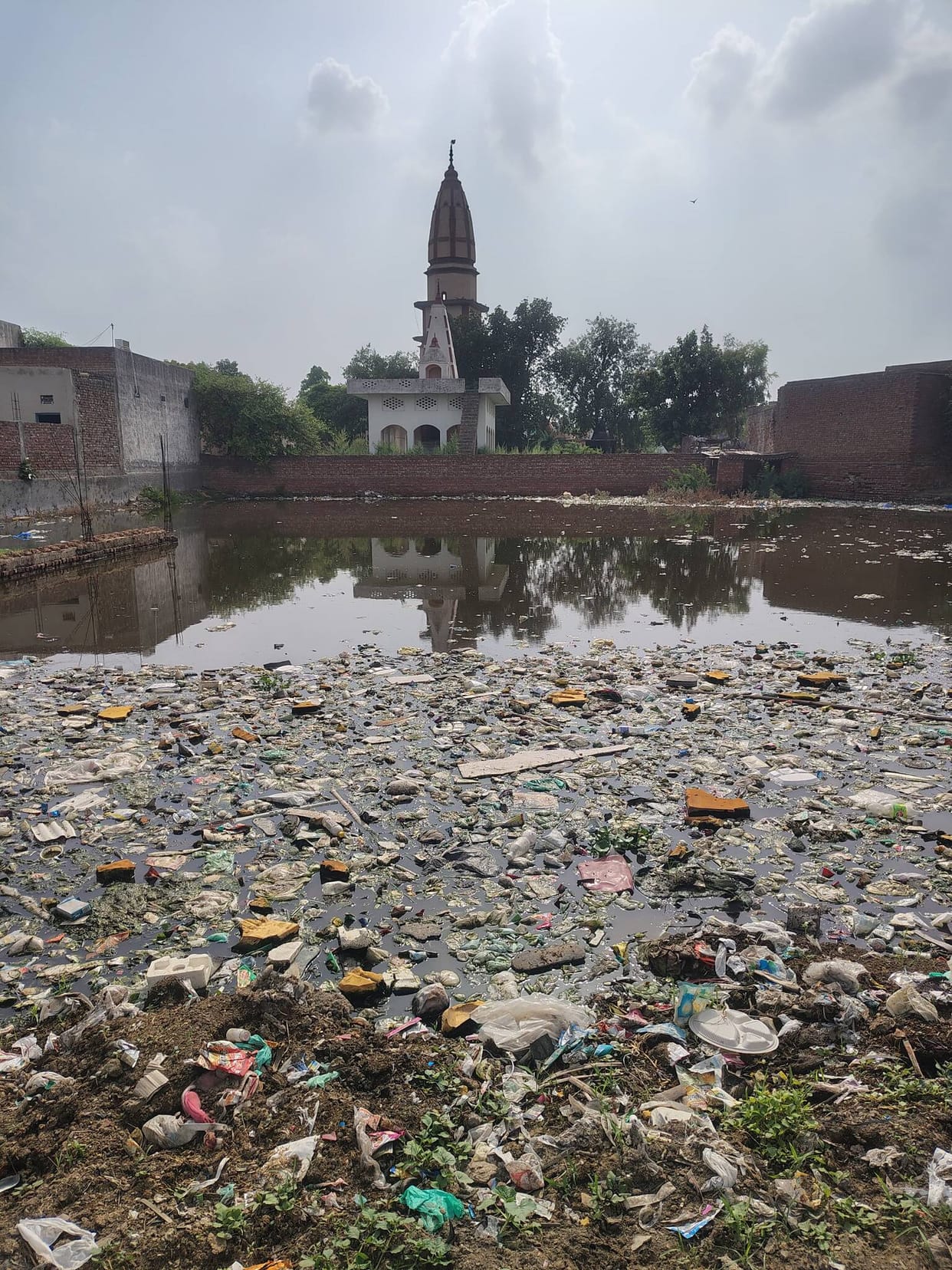 Broken culvert and clogged drains compound troubles for Datauli village.