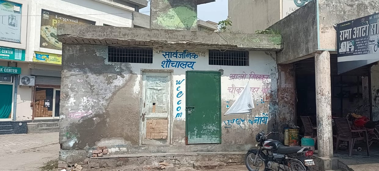 Public toilet near Ravidas Temple on Cinema Road in dilapidated condition.