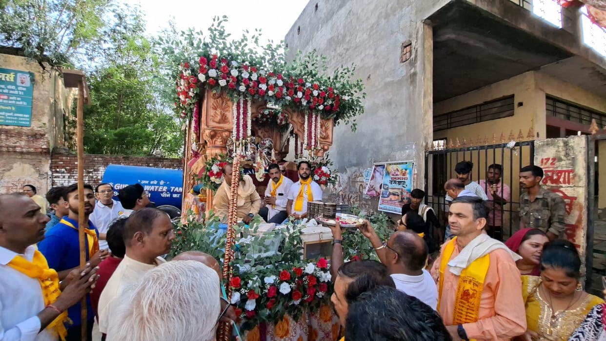 Chants of 'Jai Jagannath' echoed... flowers showered upon the Rath Yatra.