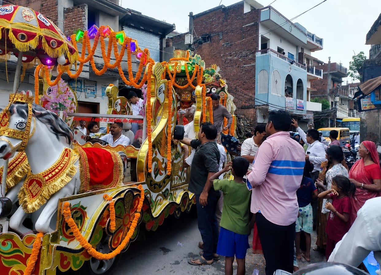 Decorated tableau of Lord Jagannath, Balabhadra, and Subhadra