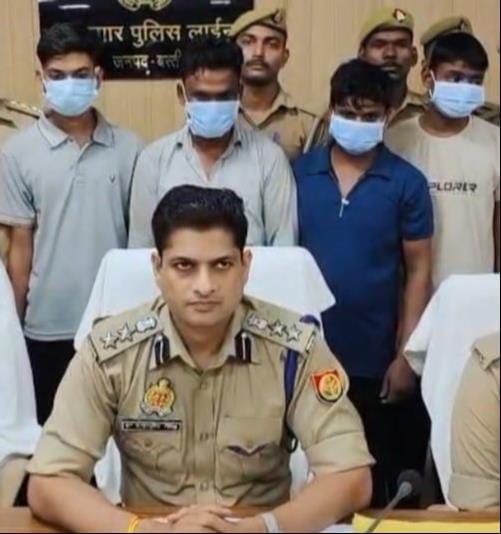 Five arrested, including two gangsters, in an encounter.