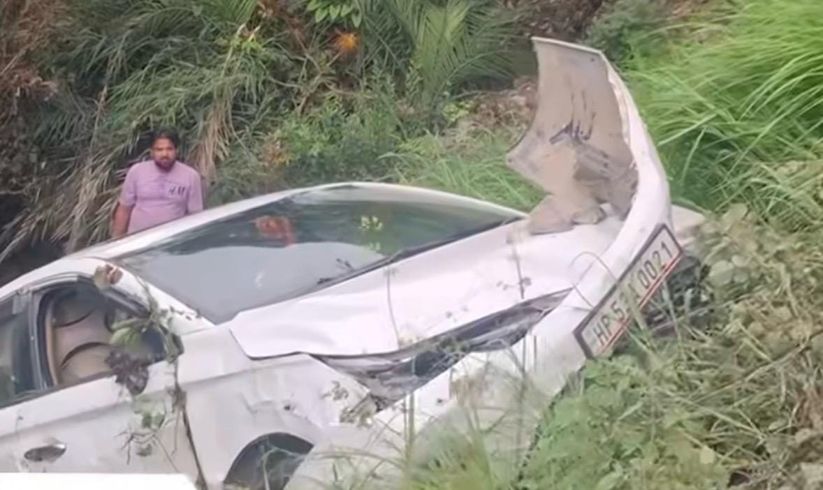 Car plunges into deep gorge near Bhalana; three injured, including a woman.