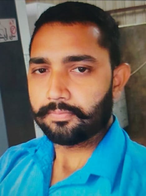 Motorcyclist dies after being hit by a vehicle.