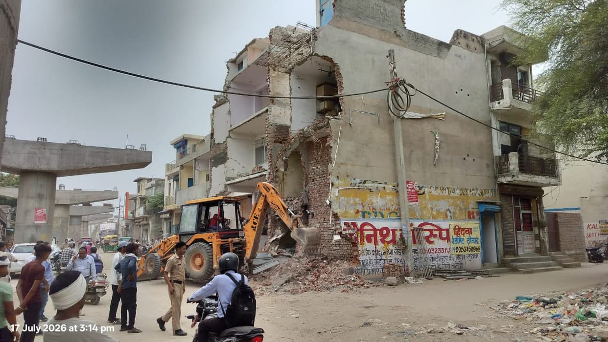 Portions of shops obstructing the construction of the elevated bridge were demolished.