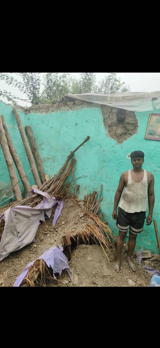 A mud house collapsed, and the family narrowly escaped.