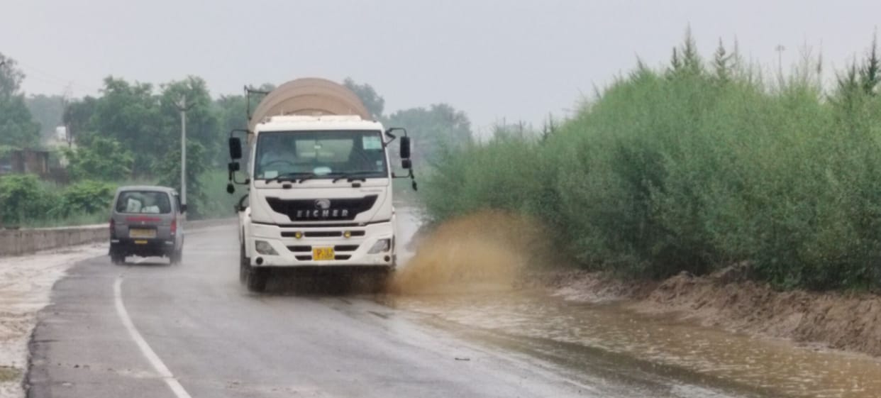 Light rain makes the weather pleasant; people get relief from the heat and humidity.
