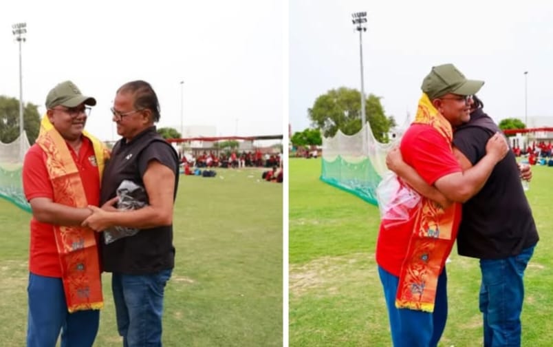 Former Indian cricketer Gyanendra Pandey bows in respect to a senior.