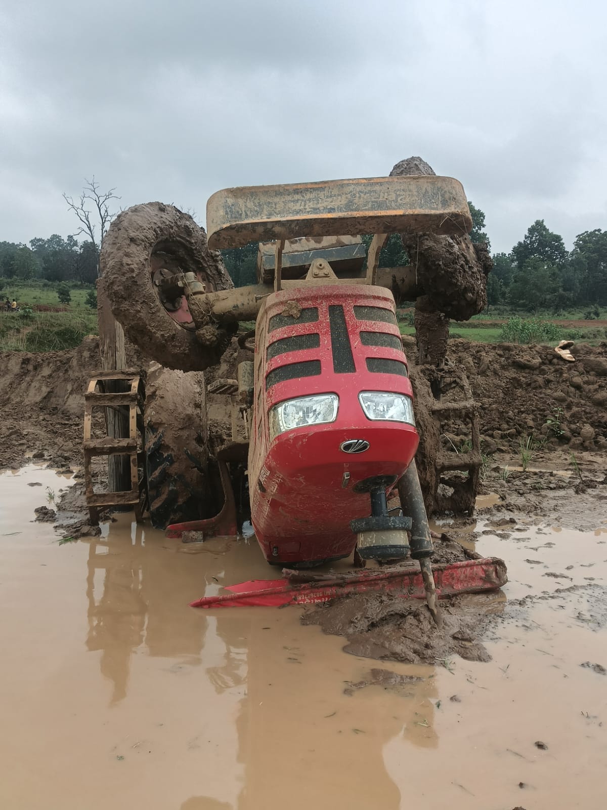 Tractor overturns while being pulled out after getting stuck in a field driver crushed to death in Ambikapur