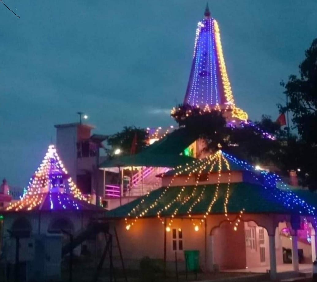 Dhaumyeshwar Mahadev Temple decked out in colorful lights for the Sawan fairs.