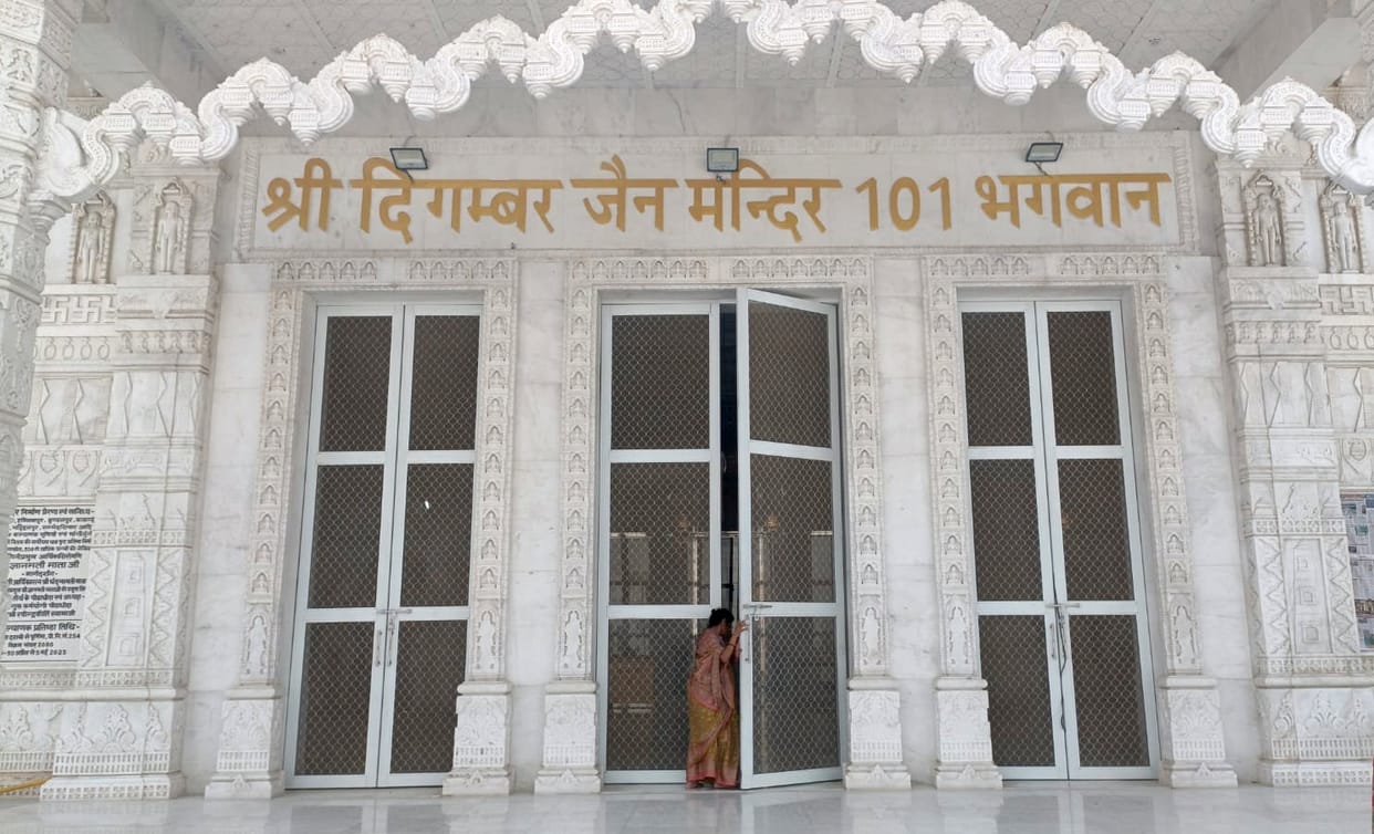 Doors opened to the shrine dedicated to the 101 sons of Lord Bharat within the Jain temple