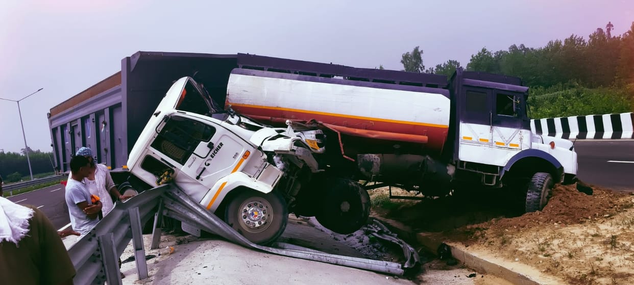 An uncontrolled trolley collided with an NHAI tanker after a tyre burst, injuring three.
