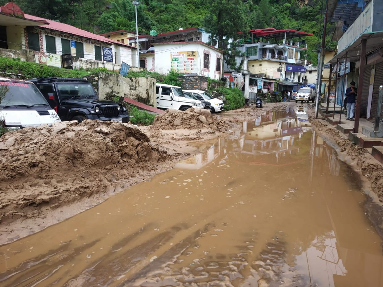 A seasonal stream overflowed, debris flooded the fields, and the canal and water tank were washed away.