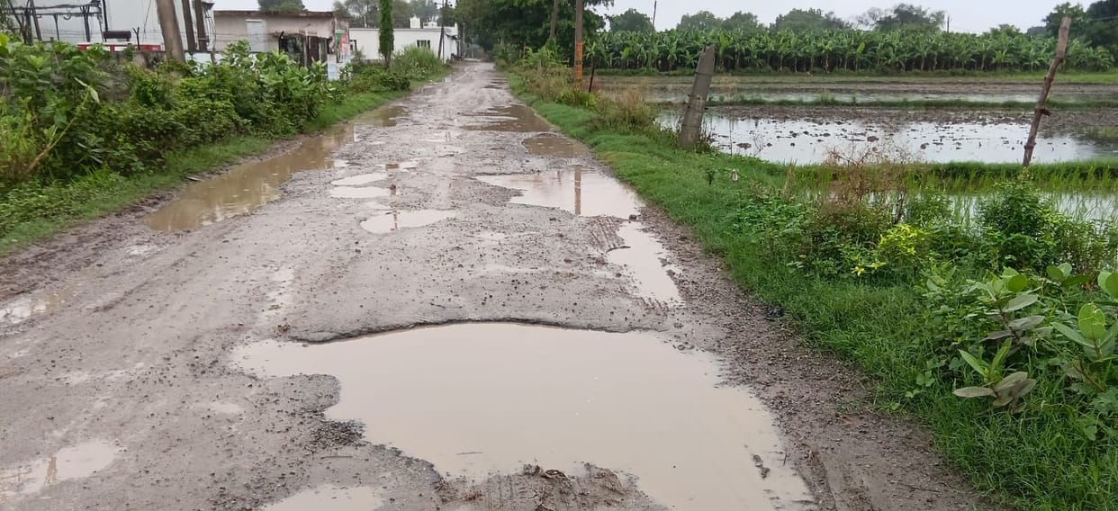 Claims of pothole-free roads crumbled in the first rain.