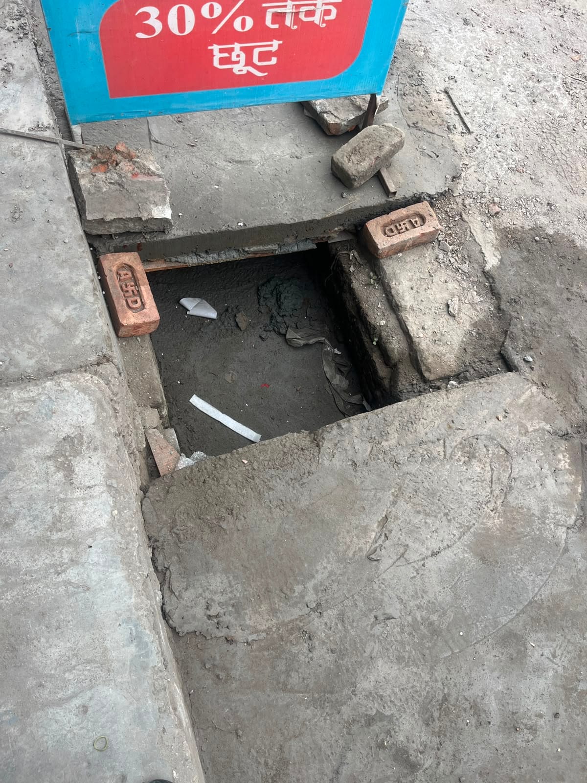 Drain slabs removed for cleaning have not been replaced even after 15 days; shopkeepers on Ambala Road are getting repairs done themselves.