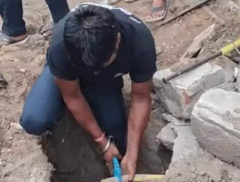 PNG pipeline severed while digging a pit for a pole; gas leak sparks panic.