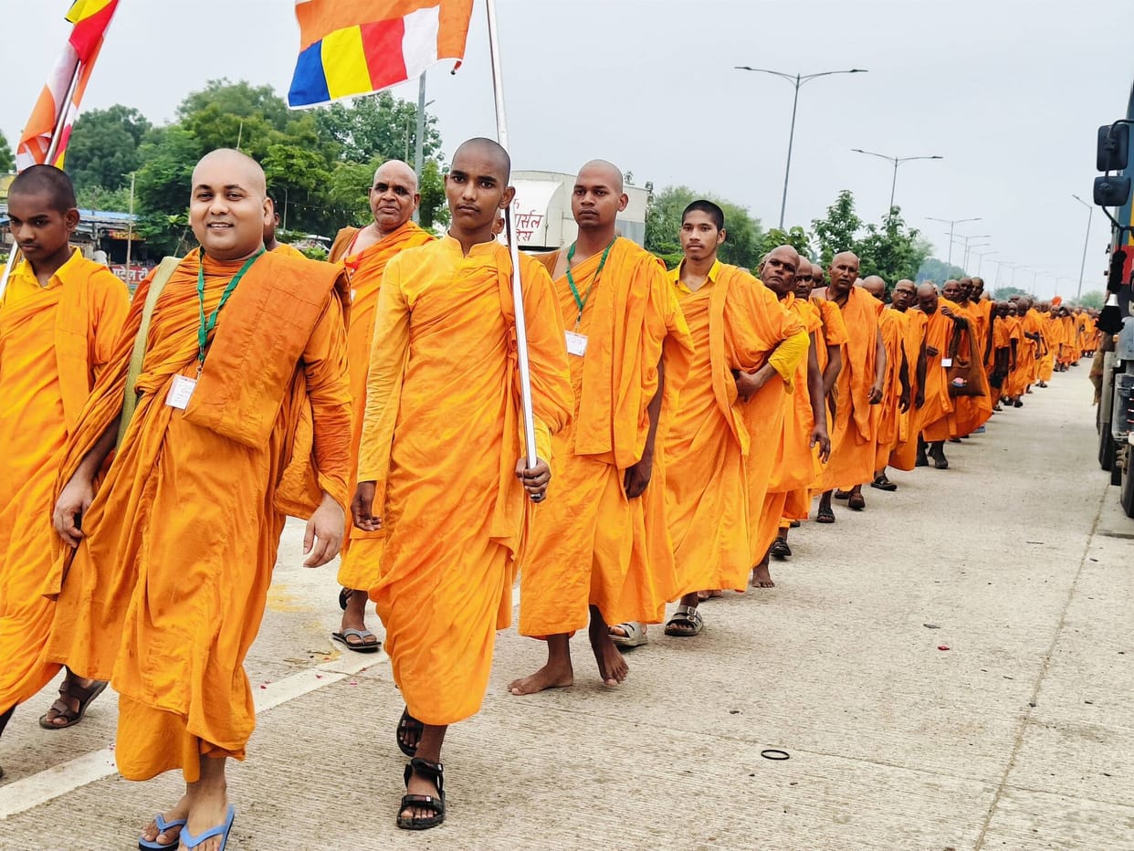 The chants of 250 Buddhist monks on the Dharmacharika pilgrimage, I take refuge in the Buddha... echoed