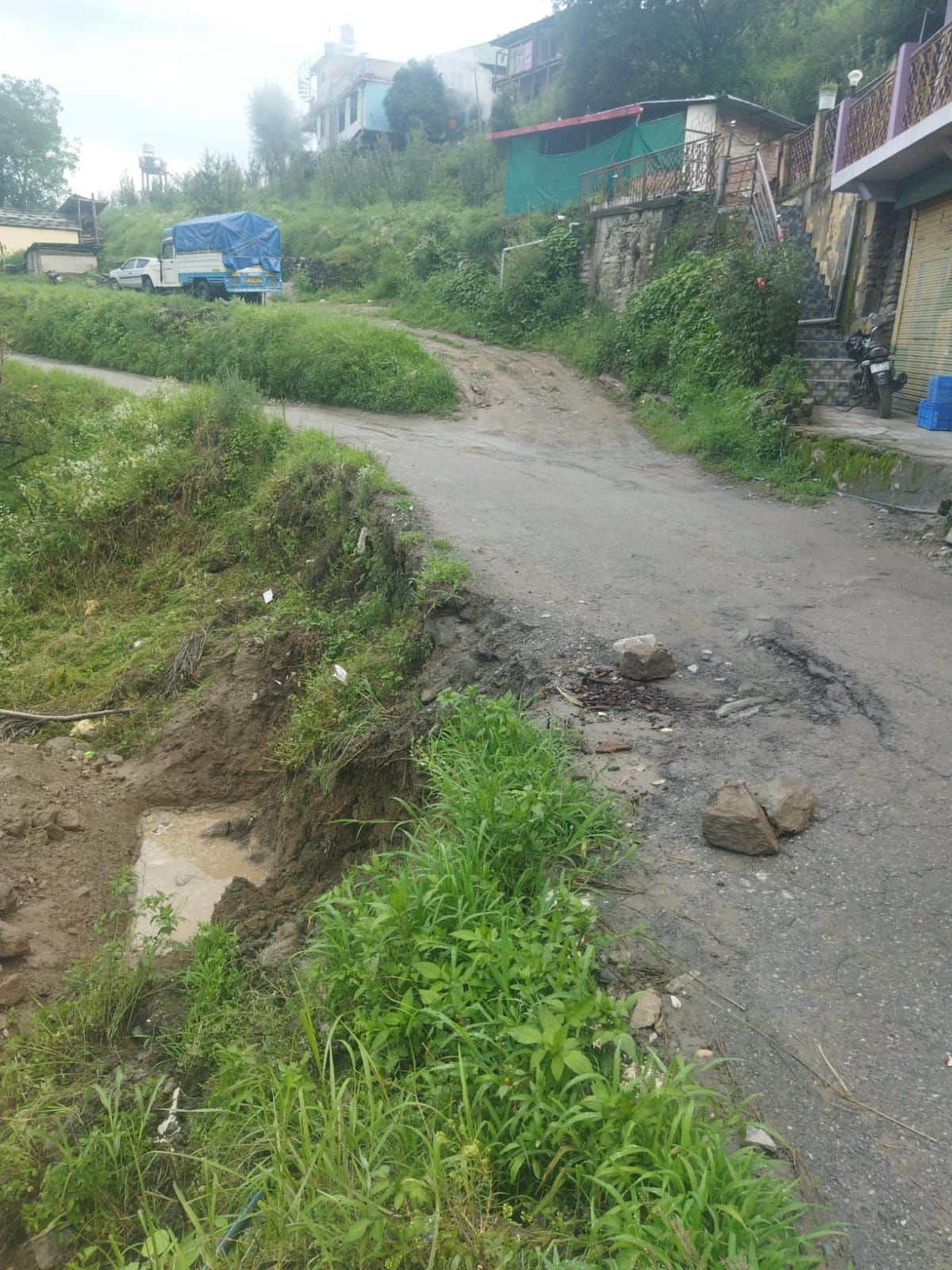Even after a year, the retaining wall has not been built; difficulties have mounted