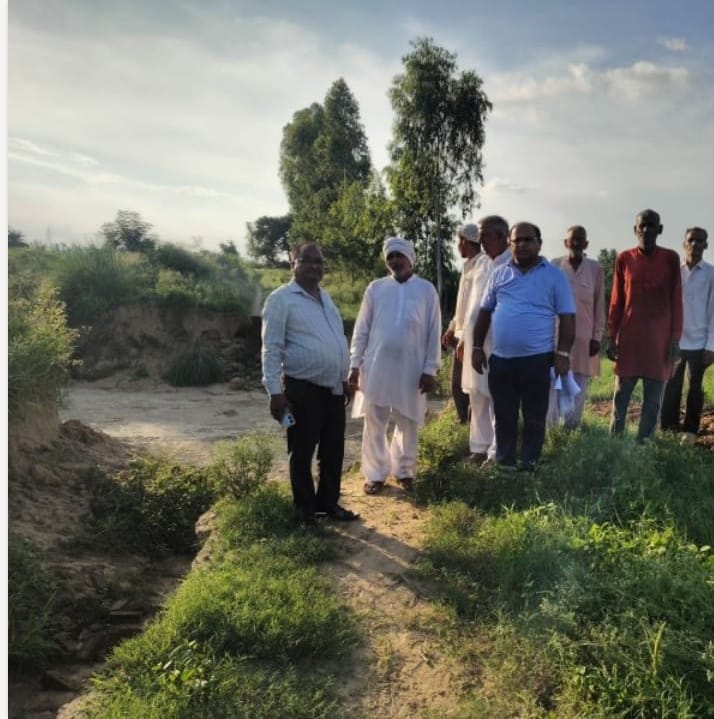 A revenue team conducted a survey of sugarcane crops destroyed by waterlogging.