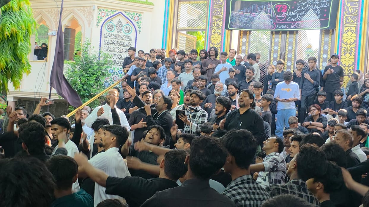 A procession featuring 72 coffins was taken out in memory of the martyrs of Karbala.