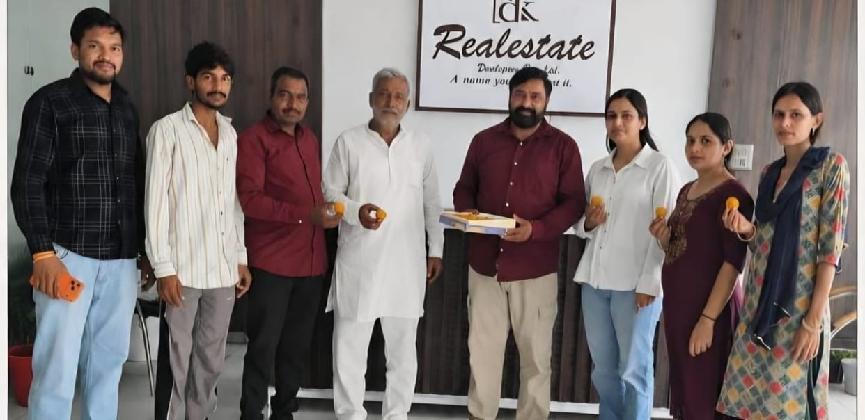 Supporters distributed laddoos upon Aarti Rao's appointment.
