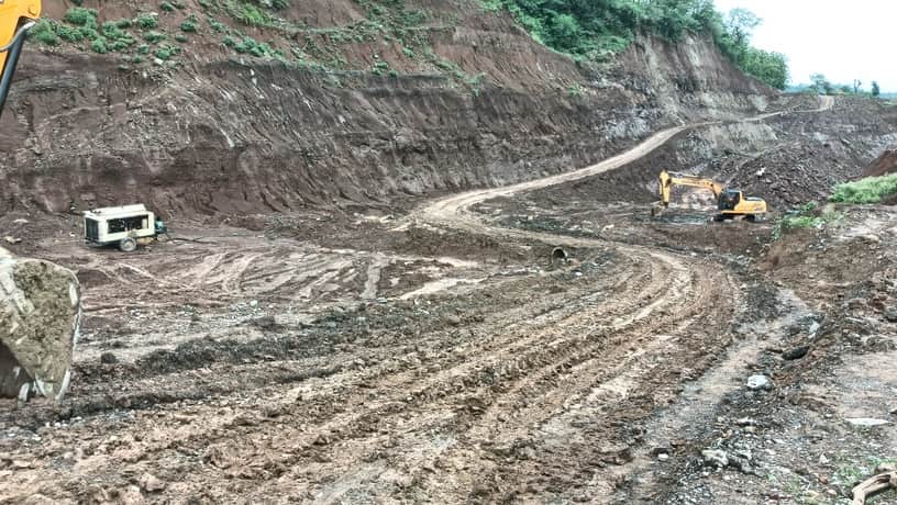 Debris from four-lane bypass excavation becomes a nuisance.