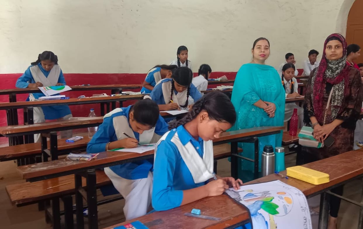 Vanshika tops the essay competition, and Prachi wins the poster competition.