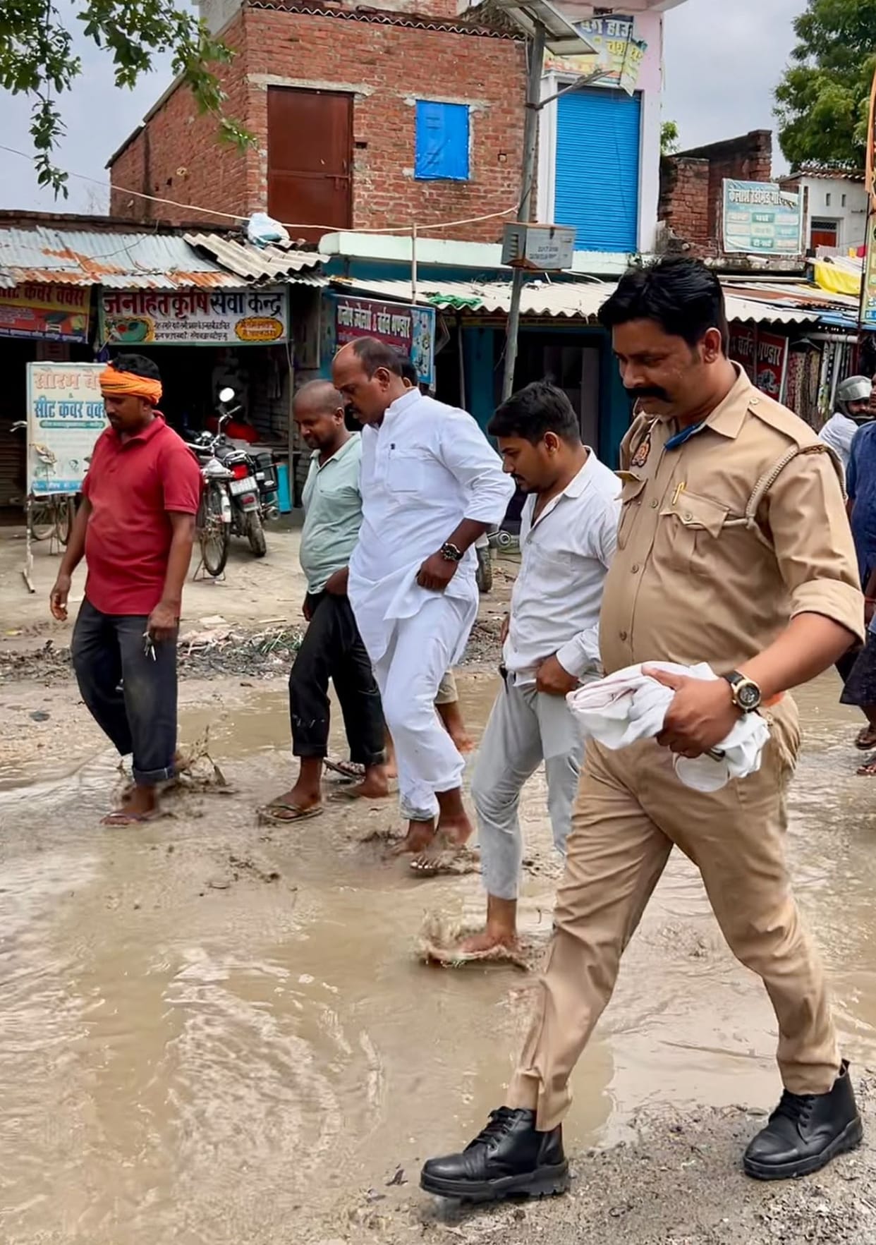 MLA steps into water-filled potholes; demands contractor be blacklisted