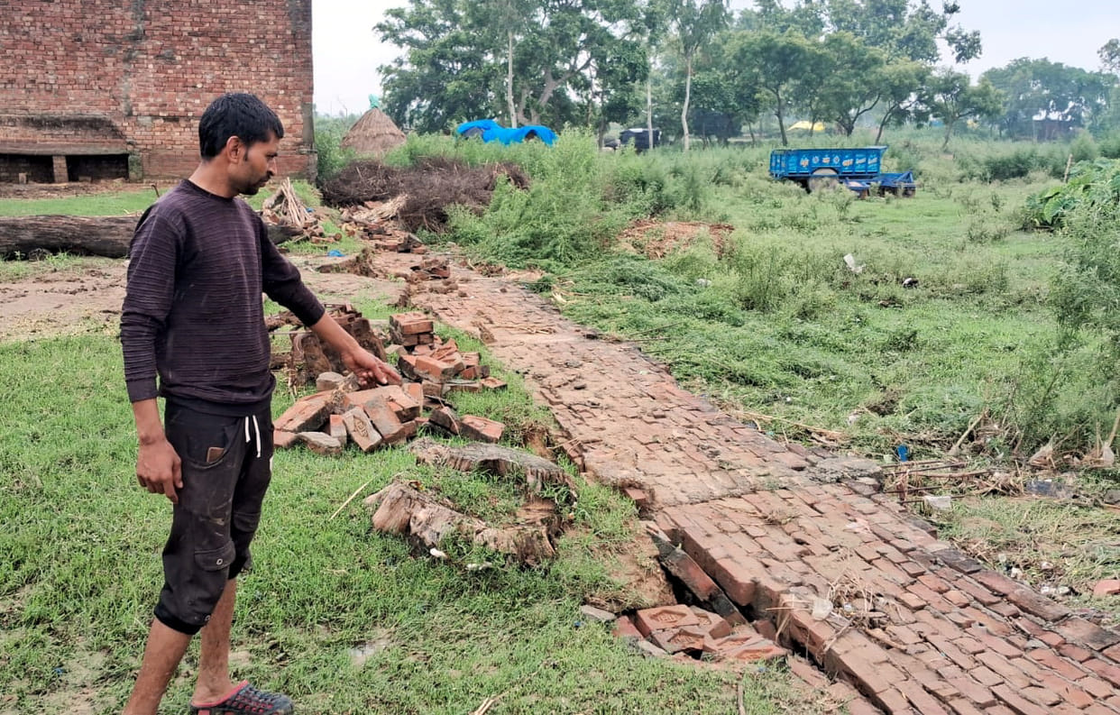 A 100-foot-long wall collapsed in Rudaina village due to rain.