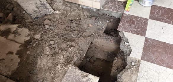 Sewage water backing up into homes... floors of 10 houses have caved in.