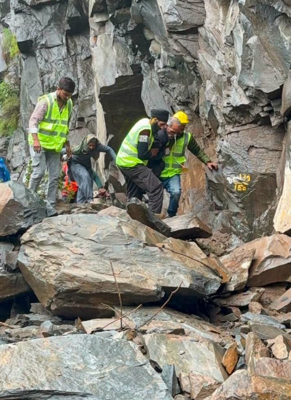 Amidst crumbling mountains, humanity remained unbroken.