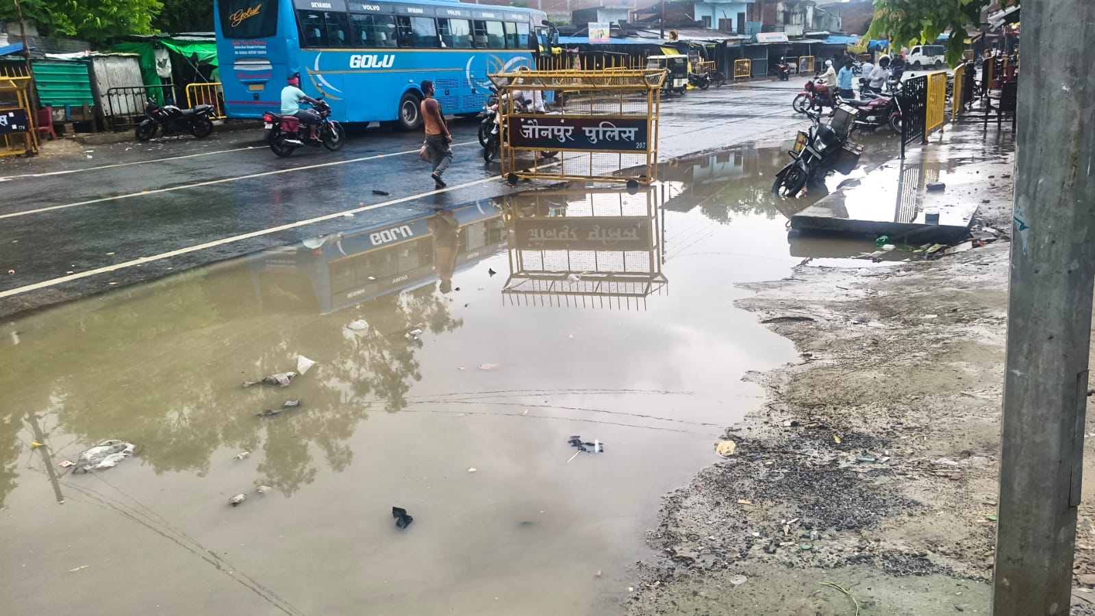 Waterlogging in Bandhva market following the first rain exacerbates problems.