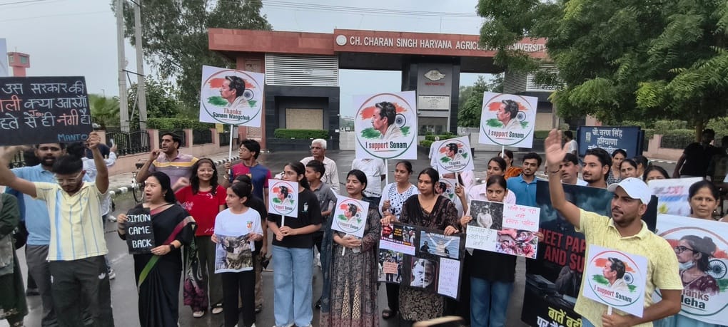 A candle march was held in protest against the baton charge on students