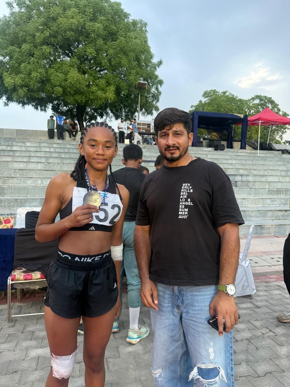 Athlete Treja won silver in the 100m race.