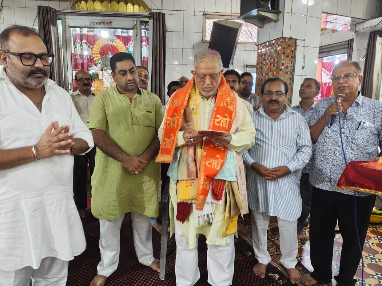 Finance Minister releases magazine at Shri Krishna Temple.
