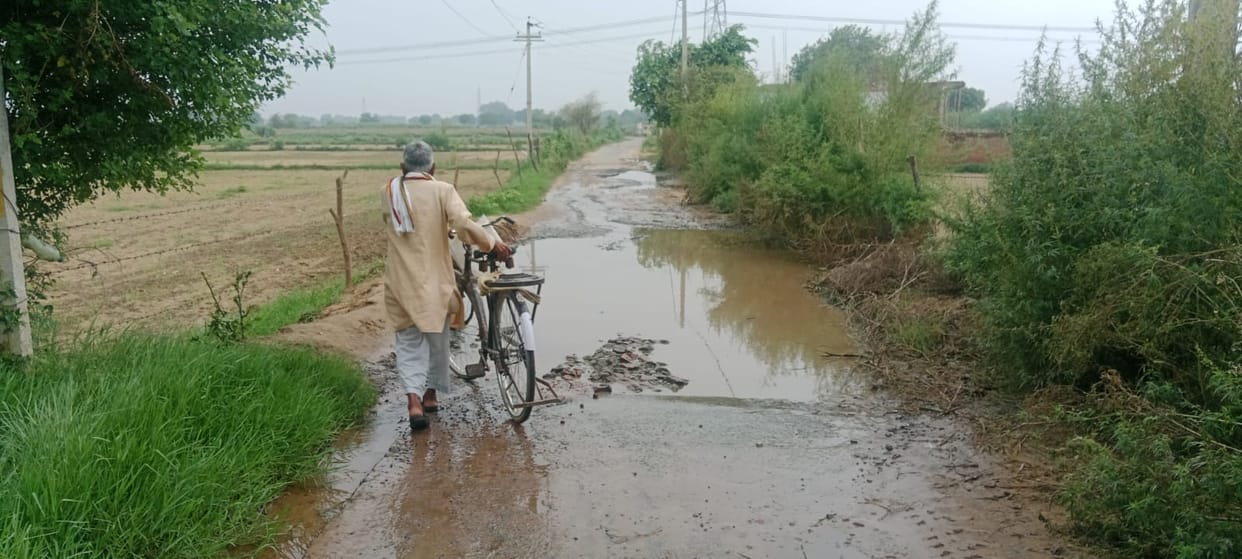 The uprooted road near Nagupura became a problem