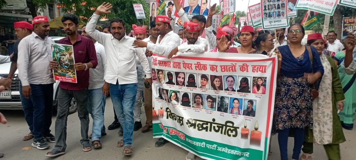 SP held a candle march against the NEET paper leak