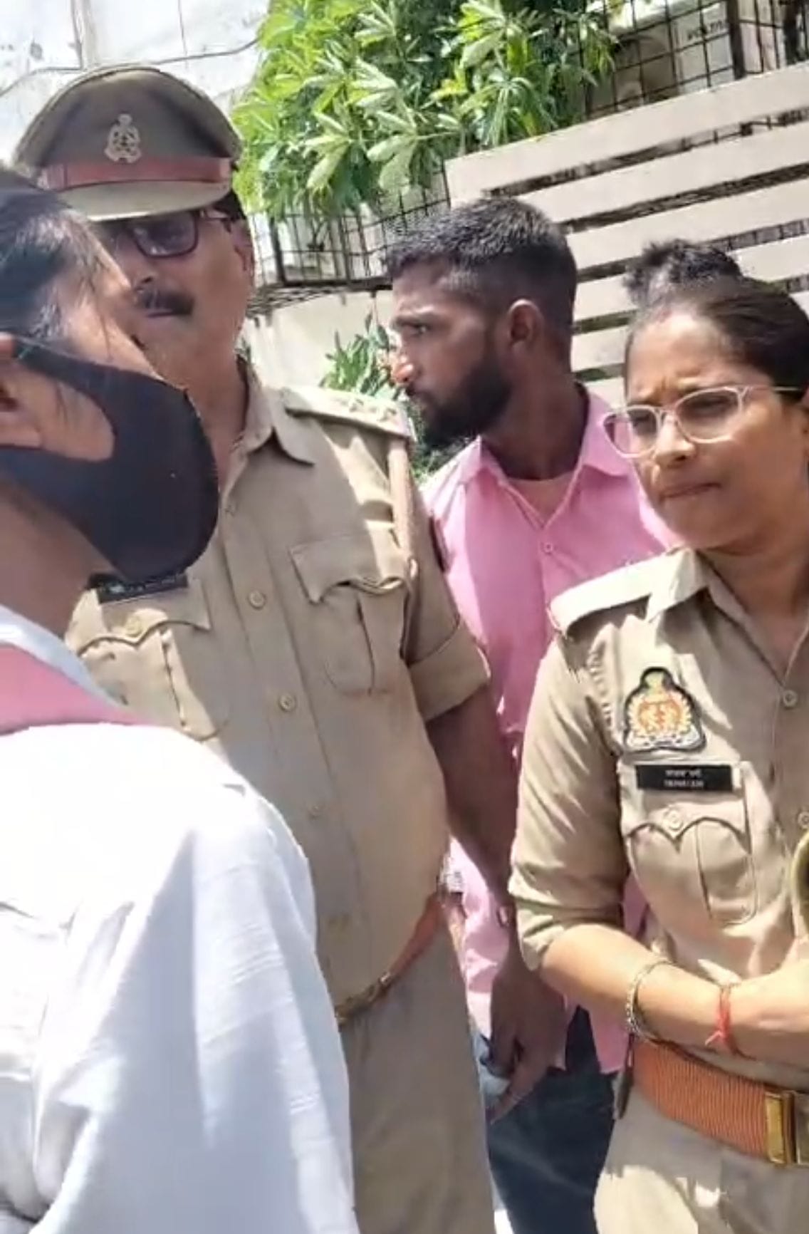 Female student questioned for removing BJP flag.