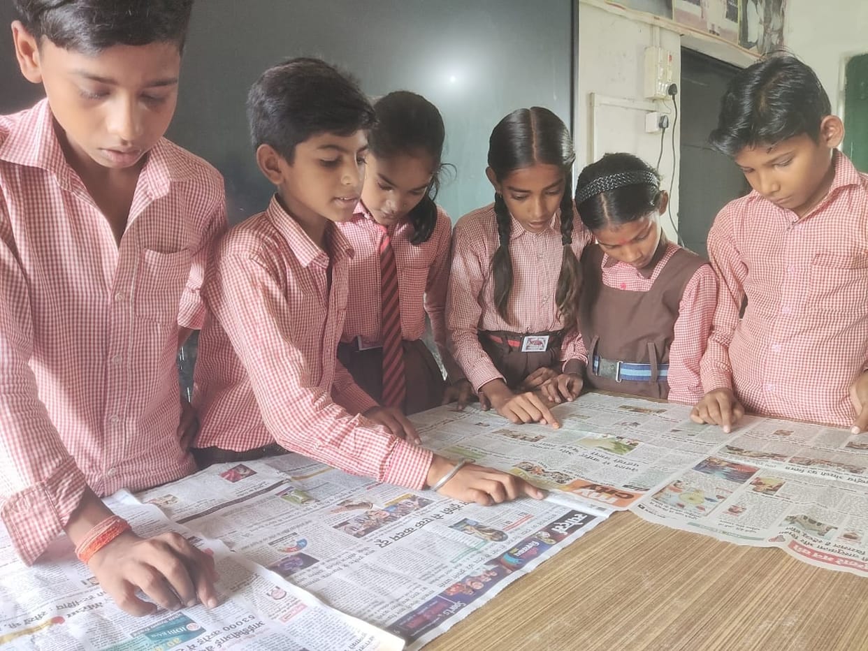 Facilitate discussions on news during assembly and in classes