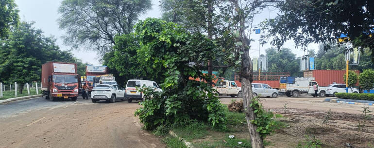 Traffic jam due to long queues of vehicles at CNG pump.