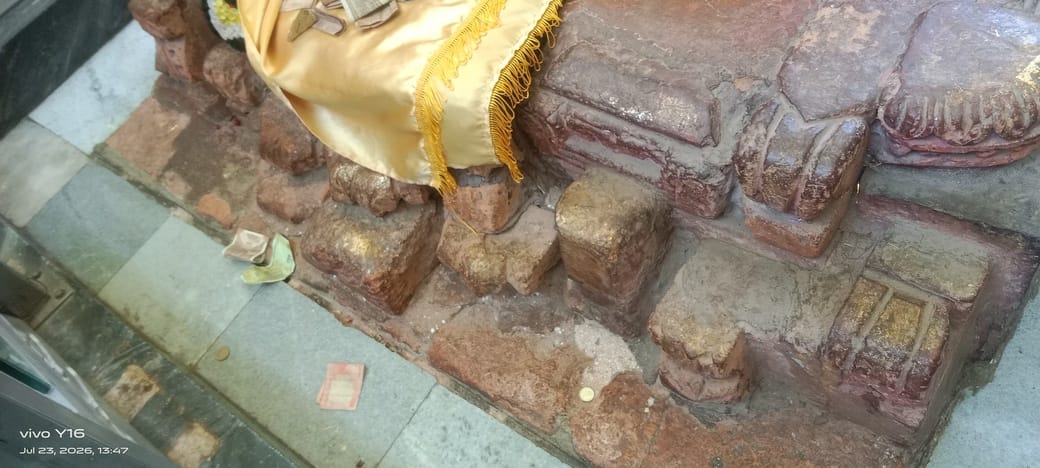 Dampness reaching the foundation of the reclining statue of Mahatma Buddha; erosion raises concerns.