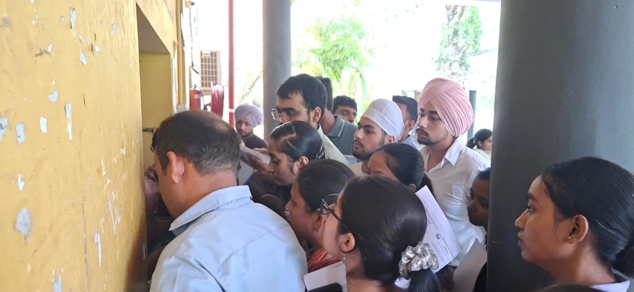 Students arrived at the college to deposit fees for admission to undergraduate courses