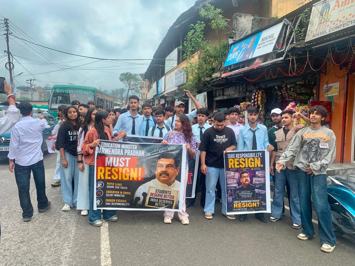 Students protest in Palampur against the lathi charge.