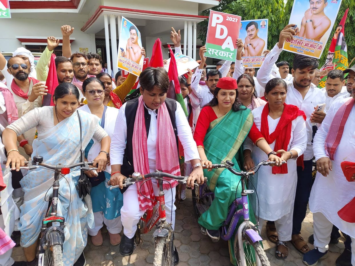 Permission for a bicycle rally was denied, so a foot march was undertaken; a scuffle with the police ensued.