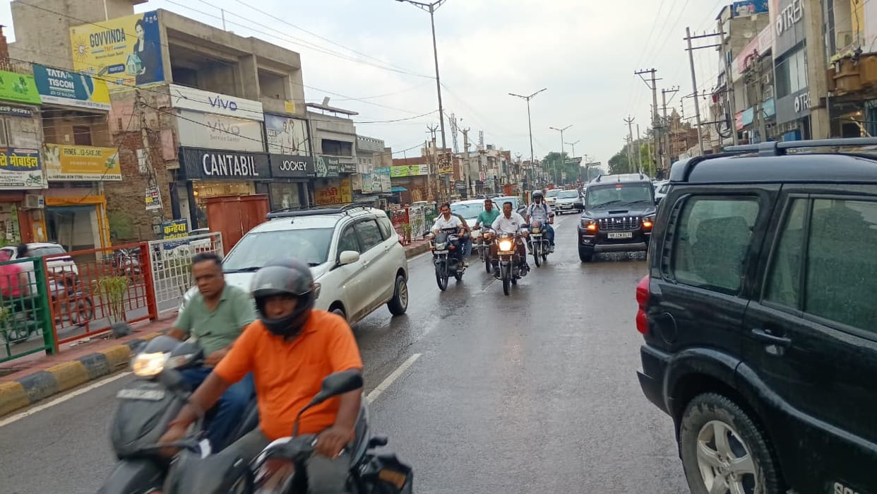 Waterlogging on city roads; rain acts as a lifeline for crops in the fields
