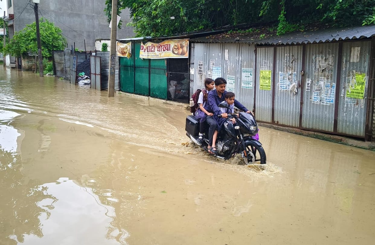 Waterlogging on the road; commuting difficulties.