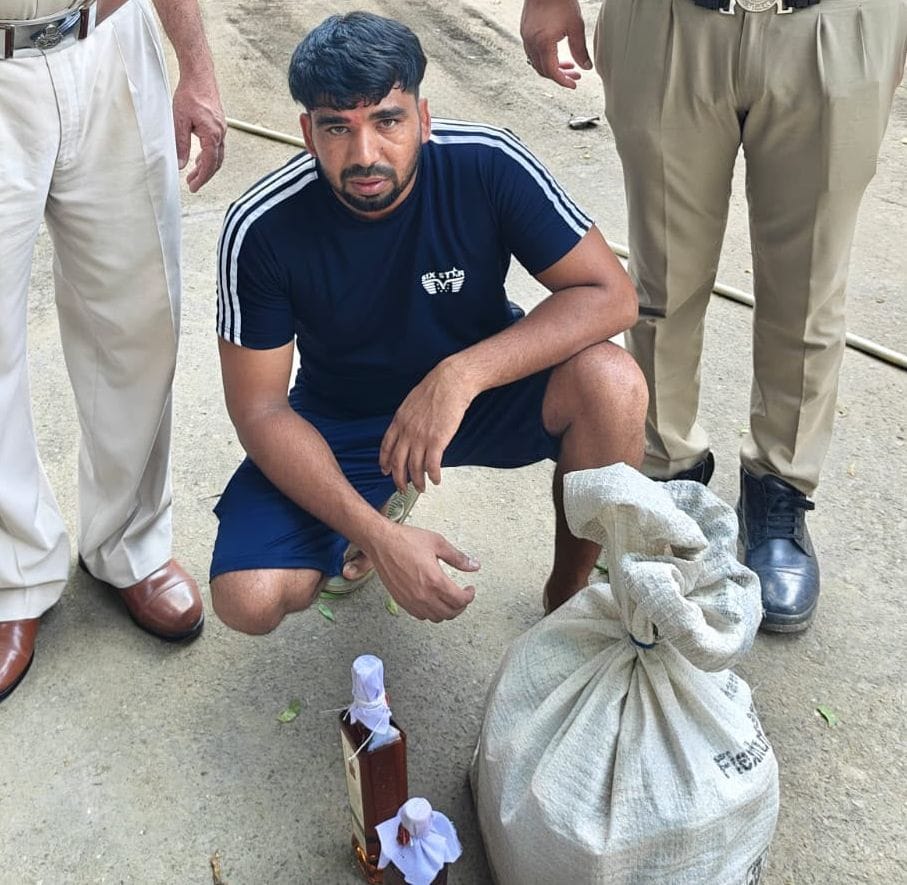 Accused arrested with 24 bottles of liquor.