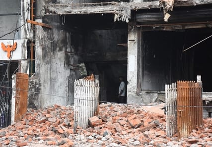Notice period expires; building could not be demolished within 15 days.